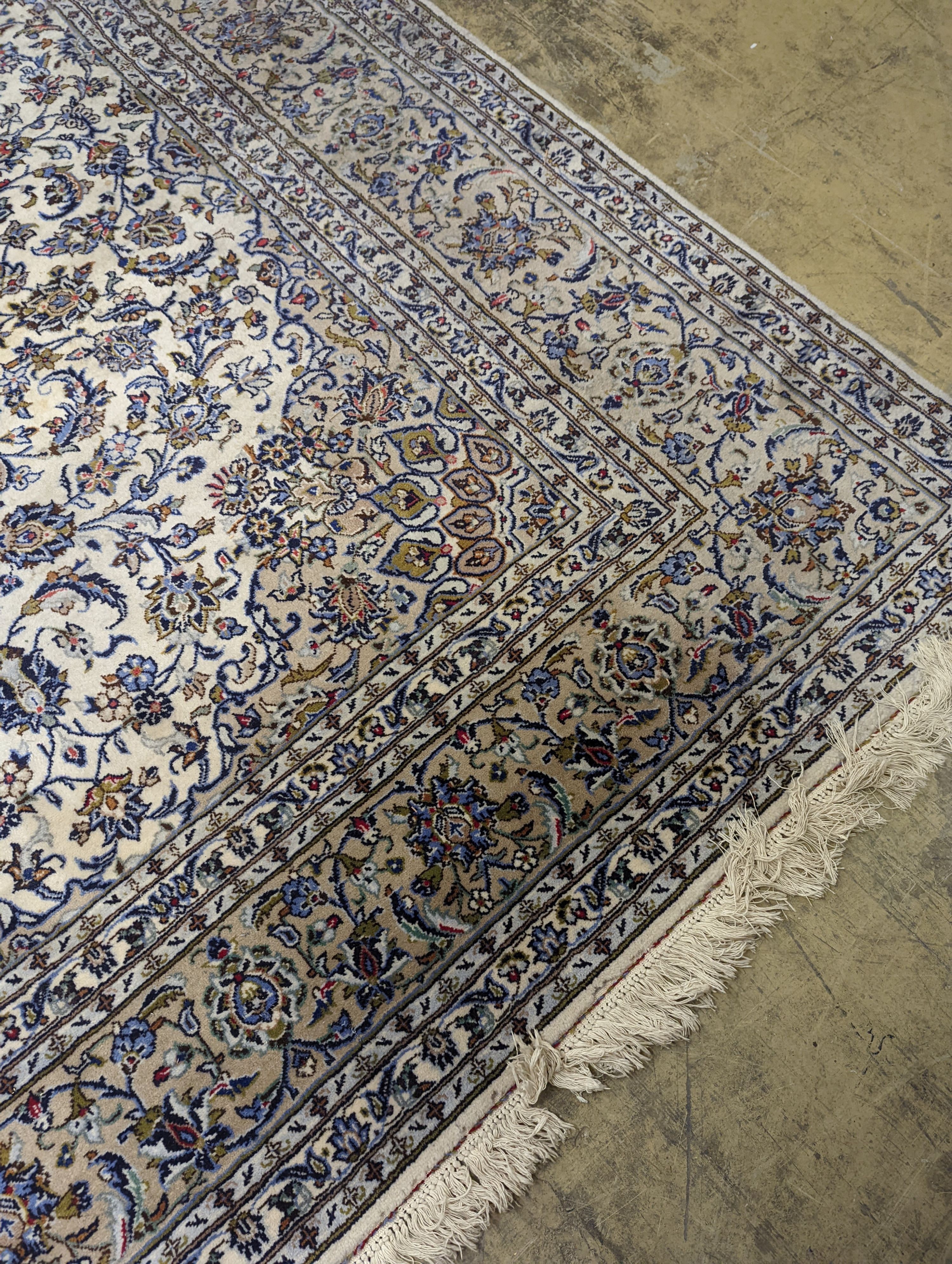 A Nain ivory ground carpet, 315 x 214cm